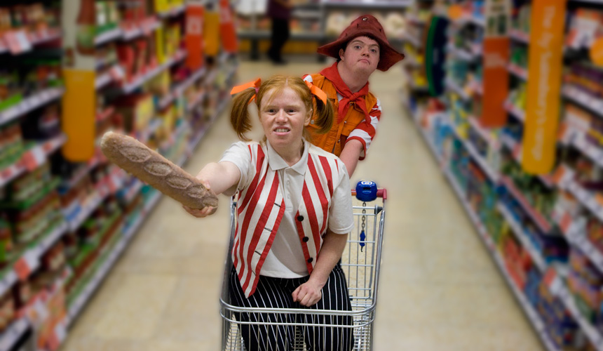 Picture of 2 people dressed as pirates with a shopping trolley in a supermarket