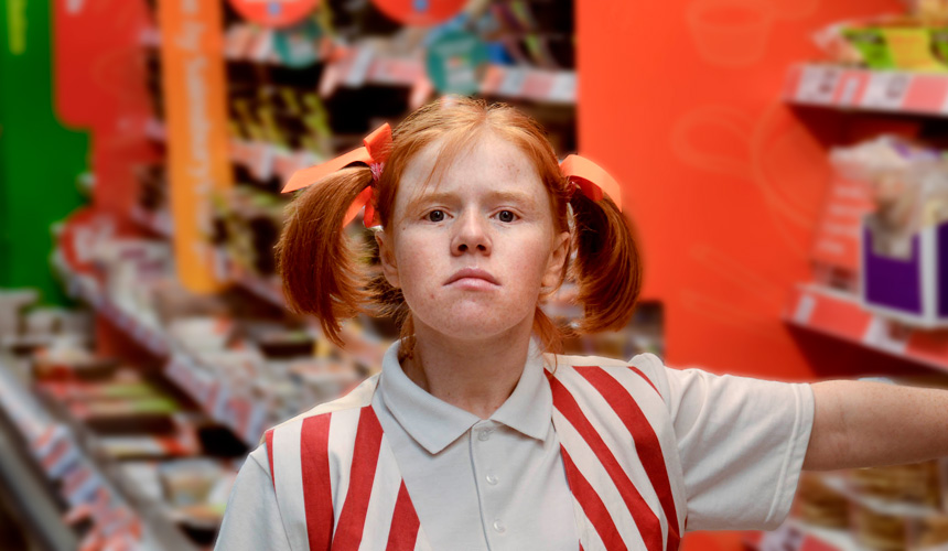Picture of a woman dressed as a pirate in a shopping aisle
