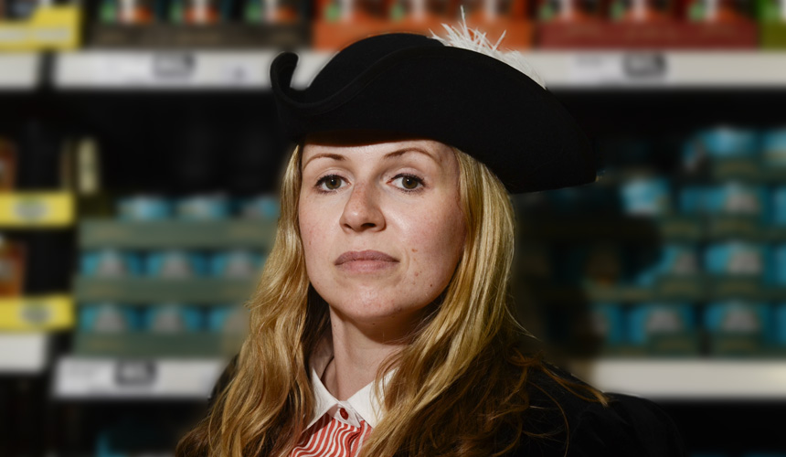Picture of a woman dressed as a pirate in a shopping aisle