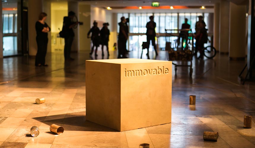 Picture of Immovable block surrounded by tin cans