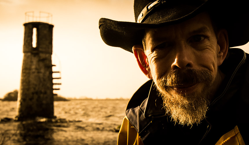 Picture of Jez in front of lighthouse