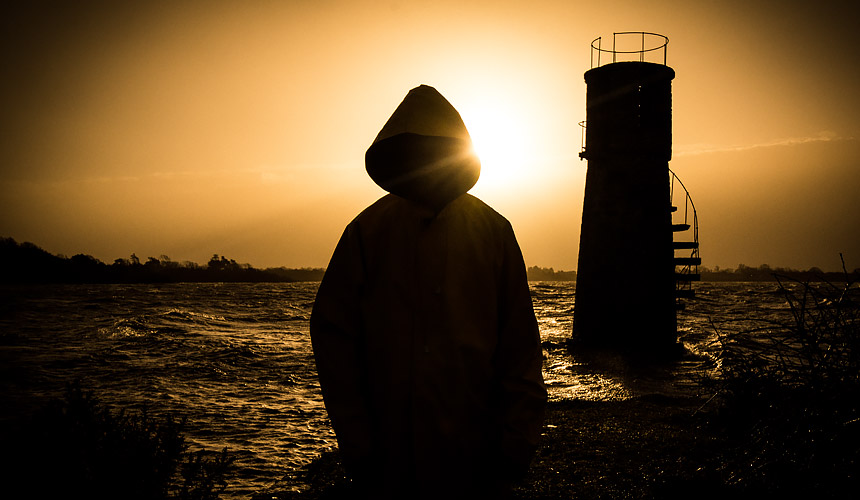 Picture of Jez in front of lighthouse